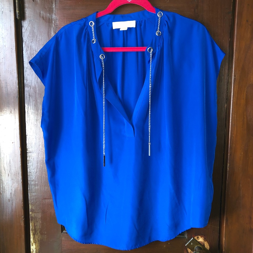 Vibrant blue Michael Kors blouse with silver chain